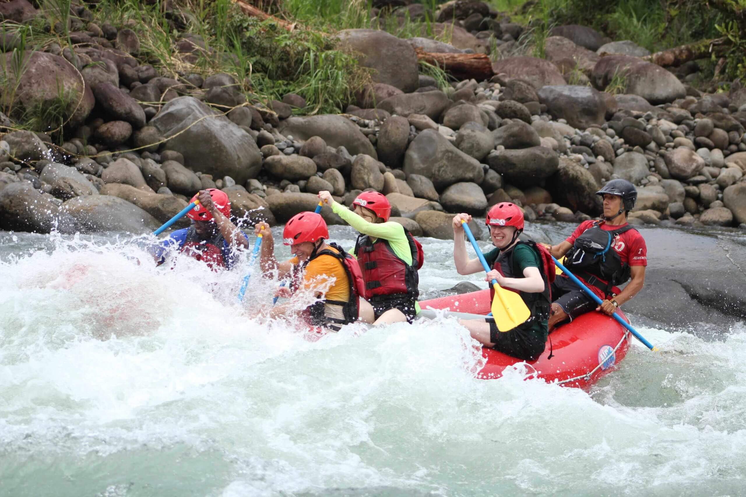 A rafting group riding the rapids of the Sarapiquí River